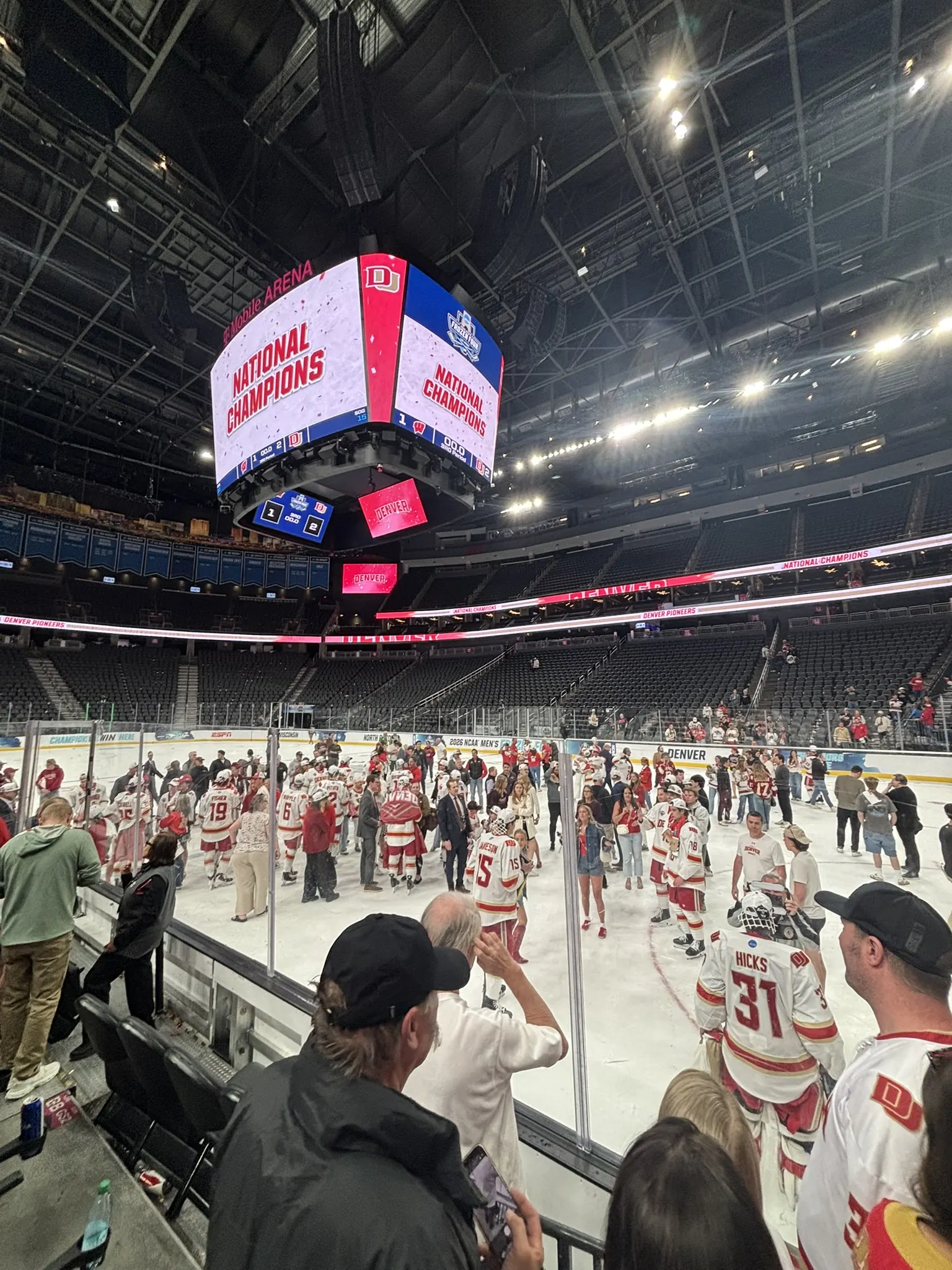 National Champions on the T-Mobile Arena videoboard as the Pioneers celebrate on the ice in Las Vegas
